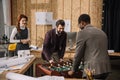 architects playing table football Royalty Free Stock Photo