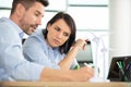 architects studying plans in modern office together Royalty Free Stock Photo