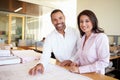 Architects Studying Plans In Modern Office Together Royalty Free Stock Photo