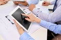 Architects with tablet pc and blueprint at office Royalty Free Stock Photo