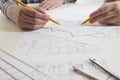 Architects working on blueprint, real estate project. Architect workplace. Construction concept. Engineering tools. Royalty Free Stock Photo