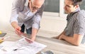 Architects working on plans Royalty Free Stock Photo