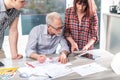 Architects working on plans Royalty Free Stock Photo