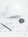 Architectural tools, blueprints, helmet, measuring tape, Construction concept. Engineering tools. Top view