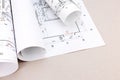 Architects workspace, plans and blueprint rolls Royalty Free Stock Photo