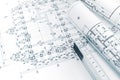 Architects workspace with project plans, rolled blueprints and f Royalty Free Stock Photo