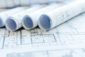 Architectural Blueprint Rolls on Technical Drawing Royalty Free Stock Photo