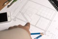 Architectural blueprints and blueprint rolls and a drawing instruments Royalty Free Stock Photo