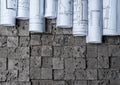 Architectural blueprints on grey wall backround Royalty Free Stock Photo