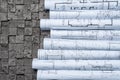 Architectural blueprints on grey wall backround Royalty Free Stock Photo