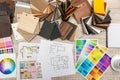 Architectural blueprints with paper and wooden color sampler on creative desk Royalty Free Stock Photo