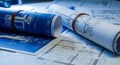Architectural Blueprints and Technical Drawings Rolled Up and Spread Out plan Royalty Free Stock Photo