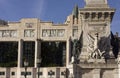 Architectural close up of Eden Teatro and column monument In Lisbon