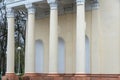 Architectural columns with figures and white stucco wealth. Royalty Free Stock Photo