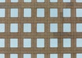 Architectural of a concrete building, symmetrical windows Royalty Free Stock Photo