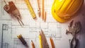 Architectural design concept with plans, pencils, and drafting equipment. Royalty Free Stock Photo