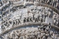 Architectural detail from ancient Marcus Aurelius Column in front of Palazzo Chigi in city of Rome, Italy Royalty Free Stock Photo