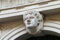 Architectural detail - carved face above the arch in Trieste, It