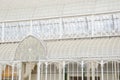 Architectural detail of greenhouse structure with iron and glass walls roof in Florence, Italy