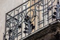 Architectural detail of a historic house in Treviso, wrought iron balcony railings. what was once normal today is an art. wrought