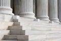 Architectural detail of marble steps and ionic order columns Royalty Free Stock Photo
