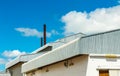 Architectural detail of metal roofing on commercial construction Royalty Free Stock Photo