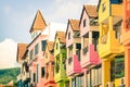 Architectural detail of multicolored vintage houses in Patong