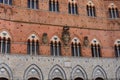 Architectural detail of the Palazzo Pubblico at the Piazza del Campo in Siena, Italy, Europe Royalty Free Stock Photo