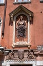 Architectural detail, a stone bas-relief of the Virgin Mary and little Jesus on the wall of a house in Venice. Picture Royalty Free Stock Photo