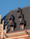 Architectural detail of windows in tiled roof of building near Grand Place, in the centre of Brussels, Belgium Royalty Free Stock Photo