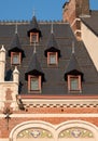 Architectural detail of windows in tiled roof of building near Grand Place, in the centre of Brussels, Belgium Royalty Free Stock Photo