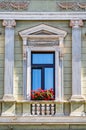 Architectural detail with the windows of an old building. Old vintage architecture in the center of Brasov, Romania