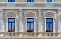 Architectural detail with the windows of an old building. Old vintage architecture in the center of Brasov, Romania