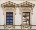 Architectural detail with the windows of an old building. Old vintage architecture in the center of Bucharest, Romania Royalty Free Stock Photo