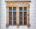 Architectural detail with the windows of an old building. Old vintage architecture in the center of Prague Castle, Czech Republic Royalty Free Stock Photo