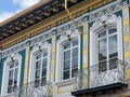 Vintage stucco facade with balcony, Cuenca, Ecuador Royalty Free Stock Photo