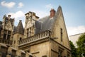 Architectural details and emblems of faculties on the roof of the Musee de Cluny a landmark national museum of medieval arts and