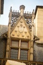 Architectural details and emblems of faculties on the roof of the Musee de Cluny a landmark national museum of medieval arts and
