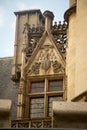 Architectural details and emblems of faculties on the roof of the Musee de Cluny a landmark national museum of medieval arts and