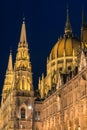 Architectural details of the illuminated Hungarian Parliament at night Royalty Free Stock Photo