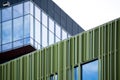 Architectural details of modern office building with reflections. Royalty Free Stock Photo
