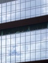 Architectural details of modern office building with reflections. Royalty Free Stock Photo