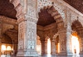 Architectural details and traditional patterns on white marble arches and pillars inside the famous historic monument of India. Co Royalty Free Stock Photo