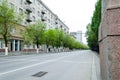 Architectural details, view of the city boulevard. trees, buildings, road. architecture