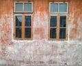 Architectural Details Vintage Window with Peeling Paint in orange.  Old vintage window of house old fashion design classic on Royalty Free Stock Photo