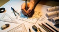 Architectural drafting hand drawing blueprints with compass ruler and pencils construction planning Royalty Free Stock Photo
