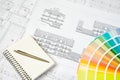 Architectural drawing and notepad Royalty Free Stock Photo