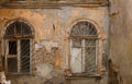 An architectural element of old building facade of typical houses in Odessa old town city center. Huge vintage windows