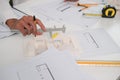 Architectural engineers, contractors, designers, sketches, blueprints and construction work for architectural buildings