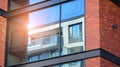 Architectural exterior detail of residential apartment building with brick facade. Royalty Free Stock Photo